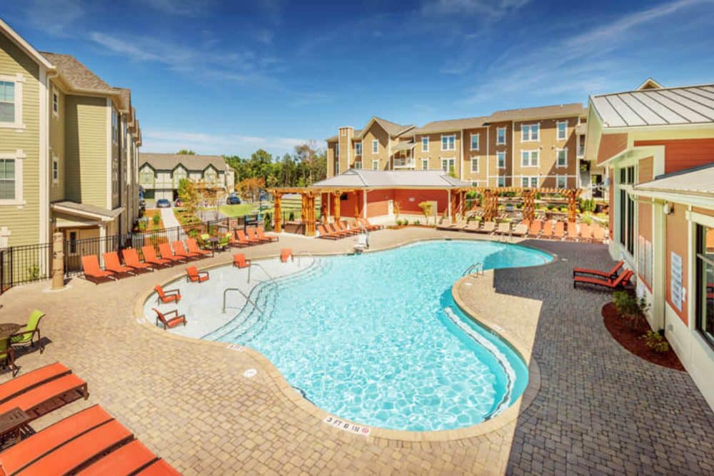 millenium one off campus apartments near the university of north carolina charlotte unc charlotte uncc aerial view of resort style pool