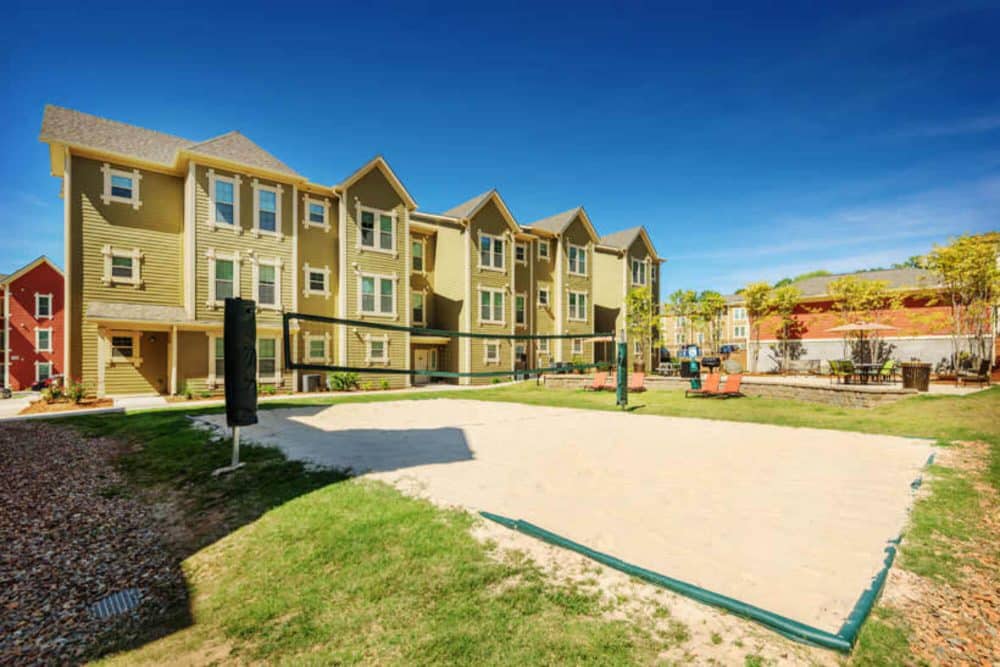 millenium one off campus apartments near the university of north carolina charlotte unc charlotte uncc sand volleyball court